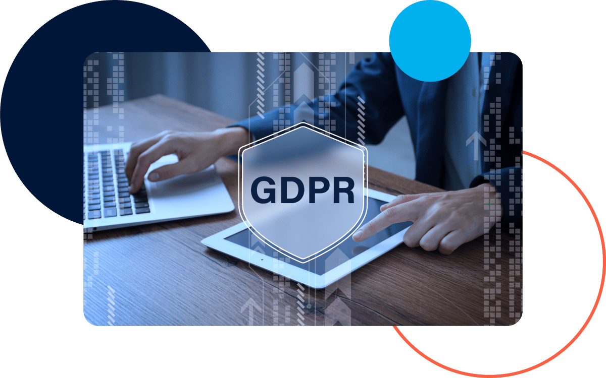 Keeping Data Secure Person using a laptop and tablet with a GDPR shield icon overlayed, emphasizing data security.
