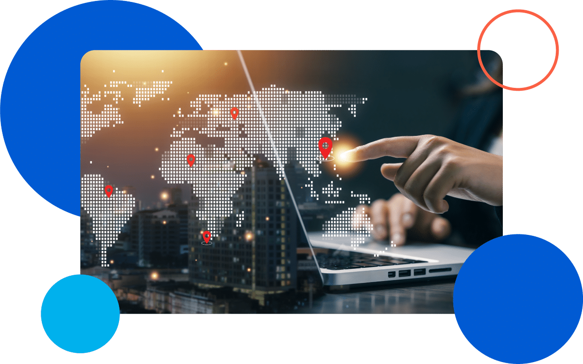 What This Means For you - Why Us Hand touching a digital world map on a laptop with location markers.